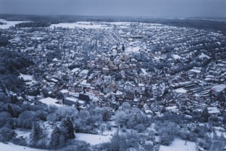 Extensive snow-covered urban area with forests and dense residential areas, Altensteig, Calw