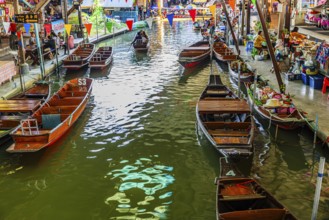 Wooden boats on the Damneon Saduak floating markets channel, near Bangkok, Ratchaburi district,