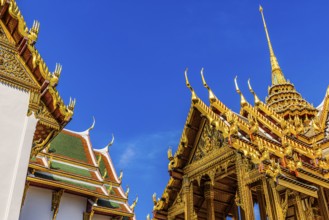 The Grand Royal Palace, the gilded Abhorn Bimok Pavilion with overlapping roofs and curved chofas,