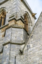 Church and cemetery over Borthwick Castle, Midlothian, Scotland, UK