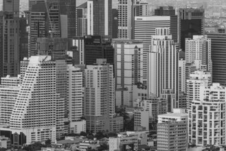 Over the rooftops of Bangkok, view from the Moon Bar on the roof terrace of the Banyan Tree hotel,