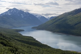 View of blue lake and mountains on Twin Peaks Trail, Eklutna Lake, Chugach Mountains, Chugach State