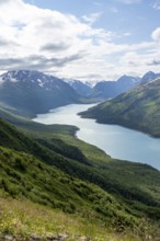 View of blue lake and mountains on Twin Peaks Trail, Eklutna Lake, Chugach Mountains, Chugach State