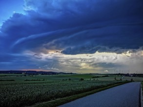 Supercell, approaching thunderstorm with impressive and threatening cloud formation, a thunderstorm