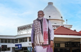 A large cutout of Indian Prime Minister Narendra Modi installed outside Kamakhya railway station as