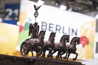 The chocolate quadriga as part of the entire Brandenburg Gate at the Berlin stand at the Green Week