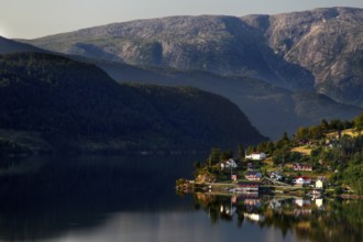Picturesque village on Hardangerfjord with mountains in the background, Ulvik, zero, Norway