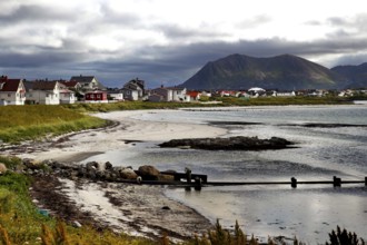Idyllic seaside village landscape with mountains in the background in Andenes, Vesterålen, Norway