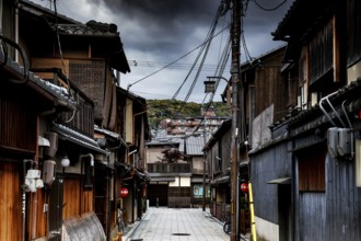 Historic street with old wooden houses in Hatsune-Koji, Gion, Kyoto, Kansai, Japan