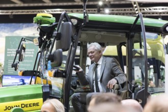 Alios Rainer (Federal Minister of Agriculture, Food and Home Affairs) sits in an electric John