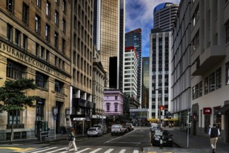 Urban crossroad in CBD with tall buildings, Auckland, zero, New Zealand