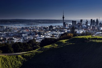 View of Auckland city and sea from Mt Eden under clear skies, Auckland, New Zealand
