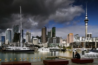 View of Viaduct Harbour with skyscrapers and sailboats in the foreground, Auckland, zero, New