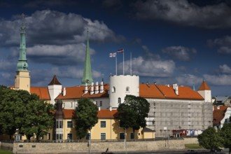 Riga Castle on the Düna with distinctive towers and cloudy sky, Riga, Vidzeme, Latvia