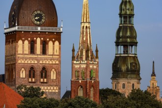 Towers of Riga churches and cathedral rise majestically on the Düna River, Riga, Latvia