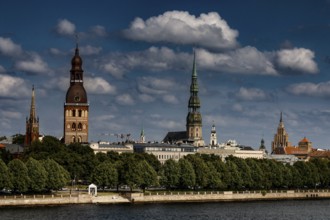 View of Riga's skyline with cathedral, St. Peter's Church and the Duna, Riga, Latvia