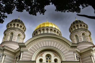 Nativity Cathedral with distinctive golden domes against cloudy sky, Riga, Latvia, Latvia