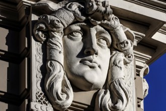 Detail of an Art Nouveau building on Elizabeth Street with a distinctive stone head, Riga, Vidzeme,