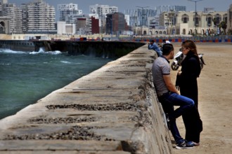 Urban waterfront with people, buildings and sea views, Casablanca, Casablanca-Settat region,