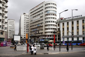 Urban scene with tall buildings, people and road traffic, Casablanca, Casablanca-Settat region,