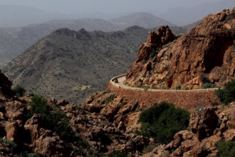 Winding road along the rocks in the mountains around Anergui, Anergui, Morocco