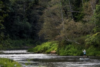 Fishermen near Kuku Klintis on the Gauja River, Gauja National Park, Latvia