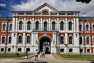 Historic castle with impressive architecture under blue sky, Jelgava, Latvia