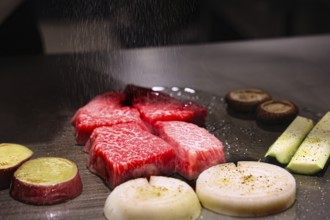 Preparation of Kobe beef and vegetables in Teppanyaki style, Kobe, Japan