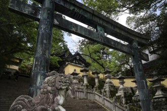 Historic torii and stairs lead to a shrine in Kotohira, Kotohira, Japan