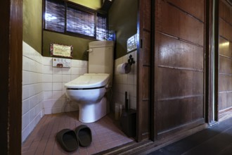 Traditionally designed toilet at Guesthouse Waraku in Okazaki, Kyoto, Okazaki, Japan