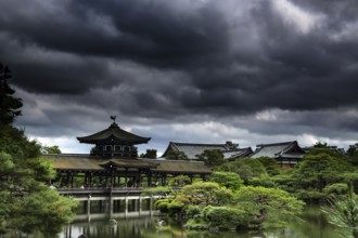 Dramatic clouds over the garden and a bridge in Kyoto, Kyoto, Okazaki, Japan