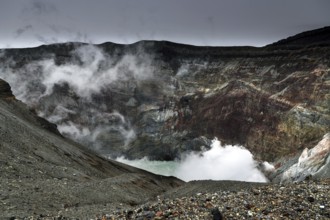 Steaming crater with geological layers and barren environment, Aso, Kumamoto, Japan