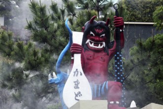 Colourful devil sculpture with steam in Kamado Jigoku in Beppu, Beppu, Kyushu, Japan