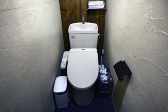 Compact toilet facility in a Japanese capsule hotel, Hakone, Kanagawa, Japan
