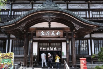 Traditional architecture of Takegawara Onsen with decorated entrance, Beppu, Japan