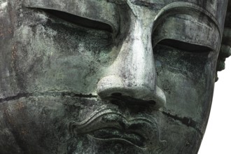 Close-up of the face of the Big Buddha at Kotokuin Temple in Kamakura, Kamakura, Kanagawa, Japan