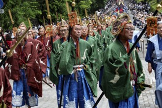 Traditionally dressed warriors march in a ceremony in Nikko, Nikko, Japan