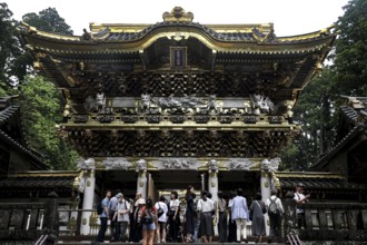Opulently decorated entrance of the Yomeimon Gate at Toshogu Shrine in Nikko, Nikko, Japan