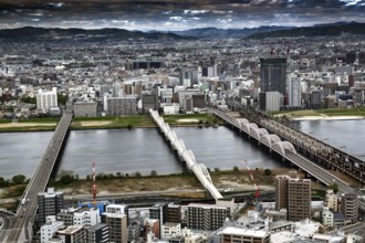 View from Umeda across the river with several bridges and thick clouds, Osaka, Umeda, Japan