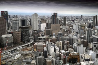 Panoramic view of Umeda skyscrapers under cloudy sky, Osaka, Umeda, Japan