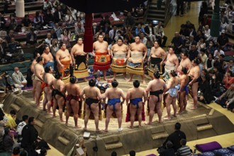 Sumo wrestlers in a ceremonial circle at Makuuchi in Sumo Stadium, Tokyo, Ryogoku, Japan