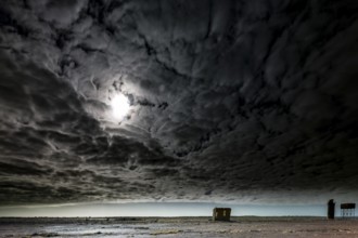 Abandoned station in gloomy sky with dramatic clouds in the outback, Oodnadatta Track, null,
