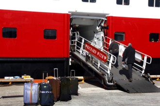 Gangway on Hurtigruten ship with luggage and passenger, Kirkenes, Finnmark, Norway