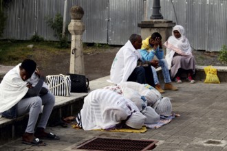 People gather praying in front of a church in Addis Ababa, Addis Ababa, Ethiopia