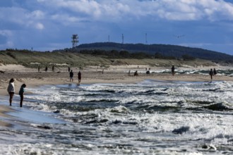 Beach visitors enjoy sunny weather at sea, Nida, Lithuania