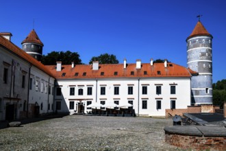 Historic Panemune Castle with distinctive towers and tiled roof