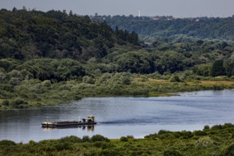 View of the Memel River from the Raudonn Castle tower, a boat passes by, Raudonn, Lithuania