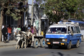 Street scene with cars and a horse-drawn cart, Mekele, Ethiopia