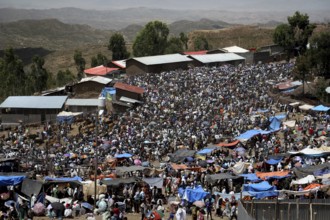 Bustling market in Lalibela full of people and colorful stalls, Lalibela, Ethiopia