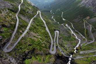 Trollstigen Serpentine Road snakes dramatically through rugged mountain scenery in Geiragervegen